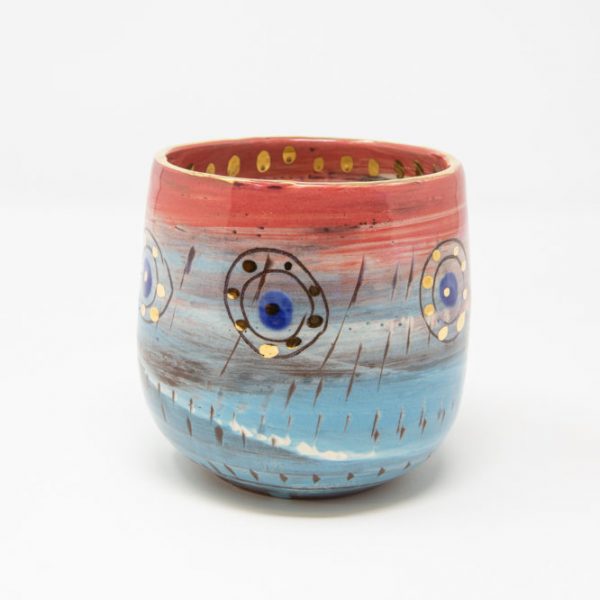 Pink and blue ceramic beaker doted with gold luster