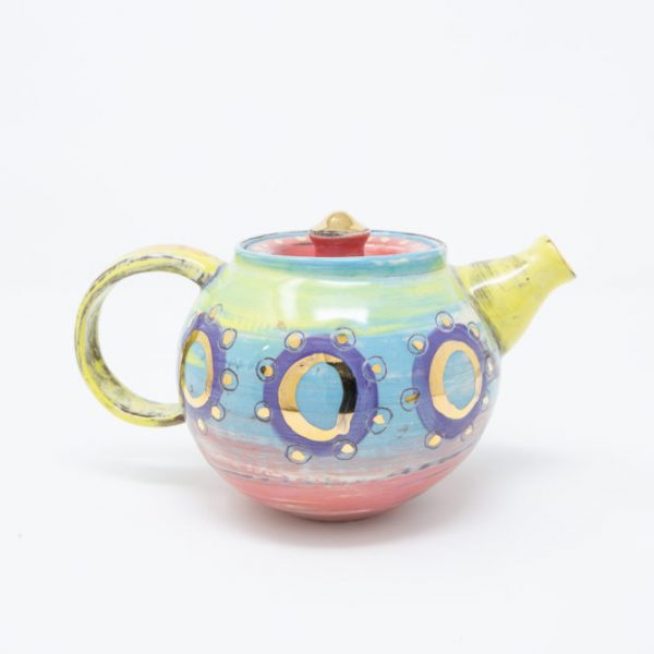 Yellow, blue and pink ceramic teapot with purple circles and dots of gold luster