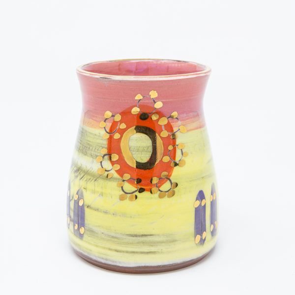 Yellow and pink ceramic vase with orange circles and dots of gold luster