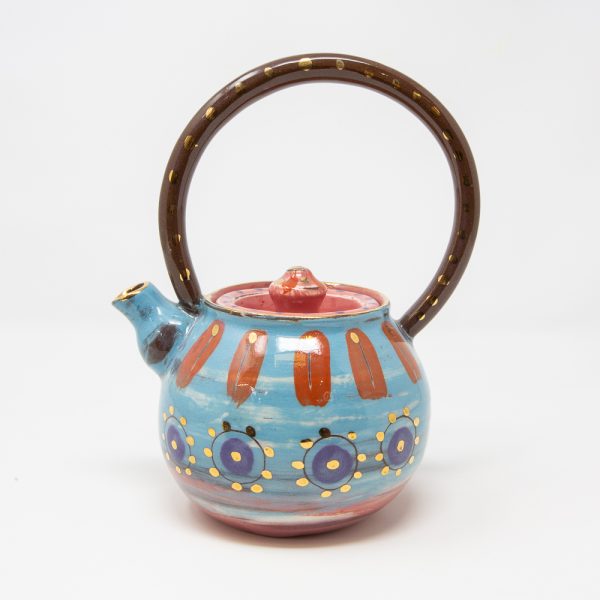 Blue, purple and pink ceramic teapot decorated with stripes and dots of gold luster