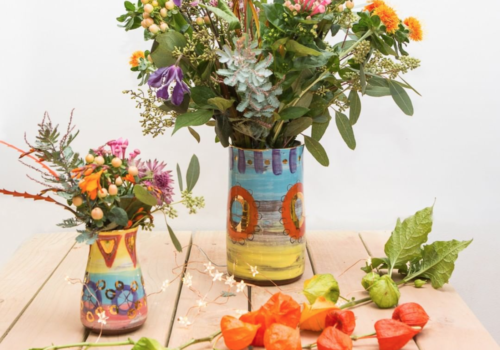 Flowers in hand made ceramic vases